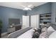 Cozy bedroom featuring closet space and a built-in desk area for studying or work at 4324 Auston Way, Palm Harbor, FL 34685