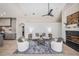 Comfortable living room showcases a fireplace, wood accents, and cozy seating at 4324 Auston Way, Palm Harbor, FL 34685