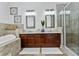 Luxurious bathroom featuring a soaking tub, double vanities, and elegant fixtures at 4907 Bayshore Blvd # 115, Tampa, FL 33611