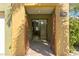 Elegant foyer with decorative metal gates leading to a staircase and an open living space at 4907 Bayshore Blvd # 115, Tampa, FL 33611