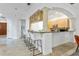 Open-concept kitchen with modern appliances, a breakfast bar, and pendant lighting at 4907 Bayshore Blvd # 115, Tampa, FL 33611