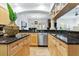 Spacious kitchen with stainless steel appliances, and a view into the living area at 4907 Bayshore Blvd # 115, Tampa, FL 33611