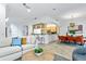 Bright and stylish living space with open layout connecting to the dining and kitchen areas at 4907 Bayshore Blvd # 115, Tampa, FL 33611