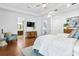 Bright main bedroom with hardwood floors, modern furniture, and ample natural light at 4907 Bayshore Blvd # 115, Tampa, FL 33611