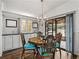 Dining area with stylish table set, decorative lighting, and built-in cabinets at 4920 Blanco Dr, Zephyrhills, FL 33541