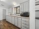 Modern kitchen with updated countertops, stainless steel appliances, and ample cabinet storage at 4920 Blanco Dr, Zephyrhills, FL 33541