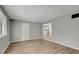 Bright living room featuring neutral paint, modern flooring, and great natural light at 5604 Cresthill Dr, Tampa, FL 33615