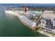 Expansive aerial perspective of the condos along the shoreline, with views of the marina and surrounding neighborhood at 6025 Shore S Blvd # 410, Gulfport, FL 33707