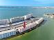 Breathtaking aerial view of a waterfront condo community with stunning water views at 6025 Shore S Blvd # 410, Gulfport, FL 33707