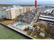 A scenic aerial view of the condos, pool, and surrounding waterfront, showcasing the complex's prime location and amenities at 6025 Shore S Blvd # 410, Gulfport, FL 33707