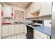 Well-lit kitchen area with practical layout and modern features for efficient cooking at 6025 Shore S Blvd # 410, Gulfport, FL 33707