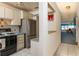 Functional kitchen design featuring modern appliances and ample cabinet space at 6025 Shore S Blvd # 410, Gulfport, FL 33707