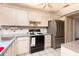 Functional kitchen design featuring modern appliances and ample counter space at 6025 Shore S Blvd # 410, Gulfport, FL 33707