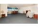 Spacious living room featuring an open layout with dining area and ample natural light at 6025 Shore S Blvd # 410, Gulfport, FL 33707