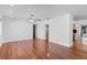 Living room with hardwood floors and modern ceiling fan at 6337 S Lansdale Cir, Tampa, FL 33616