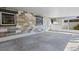 Spacious open patio features a solid block wall, providing ample space for outdoor activities at 6337 S Lansdale Cir, Tampa, FL 33616
