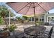 Spacious backyard with stone patio, perfect for outdoor dining and entertaining at 6835 S Shamrock St, Tampa, FL 33616