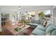 Inviting living room with a comfortable sectional sofa and lots of natural light at 6835 S Shamrock St, Tampa, FL 33616