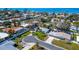 Picturesque aerial view of a charming neighborhood near the beach, showcasing lush landscapes at 920 Spruce Dr, Belleair Beach, FL 33786