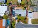 Overhead view of home featuring well-maintained lawn and proximity to pool, outlined in red at 920 Spruce Dr, Belleair Beach, FL 33786