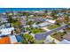 Aerial shot of a neighborhood highlighting proximity to the beach and community at 920 Spruce Dr, Belleair Beach, FL 33786