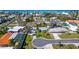 Stunning aerial of neighborhood showcasing proximity to the beach and waterways at 920 Spruce Dr, Belleair Beach, FL 33786