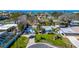 Charming single-story home with lush landscaping and well-manicured lawn near the water at 920 Spruce Dr, Belleair Beach, FL 33786