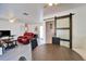 Open floor plan showcasing living and dining areas, with sliding glass doors leading to backyard at 920 Spruce Dr, Belleair Beach, FL 33786