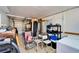Storage room with ample space, including storage racks and a washer/dryer at 920 Spruce Dr, Belleair Beach, FL 33786