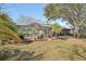 Spacious backyard with a screened pool perfect for outdoor relaxation at 12030 Steppingstone Blvd, Tampa, FL 33635
