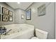 Bright bathroom features a soaking tub and custom tile work at 12030 Steppingstone Blvd, Tampa, FL 33635