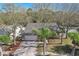 Charming single-story home with a two-car garage and well-manicured lawn at 12030 Steppingstone Blvd, Tampa, FL 33635