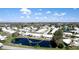 Elevated perspective of a delightful community, accented by verdant landscaping, tranquil ponds, and manicured lawns at 1320 Bottlebrush Dr, Bradenton, FL 34208