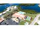 Aerial view of community clubhouse, pool, parking, and sport court at 1320 Bottlebrush Dr, Bradenton, FL 34208