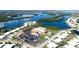 Aerial view of community clubhouse, pool, parking, and sport court at 1320 Bottlebrush Dr, Bradenton, FL 34208