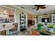 Bright living room with view to a kitchen, offering stylish decor and an open, airy atmosphere at 1320 Bottlebrush Dr, Bradenton, FL 34208