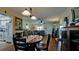 Open-concept living and dining area with a blend of modern and cozy decor at 1320 Bottlebrush Dr, Bradenton, FL 34208
