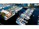 Aerial view of a busy marina with many boats docked in the calm water at 1320 Bottlebrush Dr, Bradenton, FL 34208