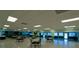 Spacious meeting room with ample seating, bright lighting, and scenic views through large windows at 1320 Bottlebrush Dr, Bradenton, FL 34208