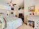 Bedroom with a desk, chair, and natural light for a comfortable living space at 13439 Norman Cir, Hudson, FL 34669