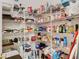 Spacious walk-in pantry with ample shelving for organized storage solutions at 13439 Norman Cir, Hudson, FL 34669