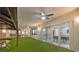 Wonderful view of pool, astroturf lanai, and multiple access points to the home at 14333 Lake Magdalene Blvd, Tampa, FL 33618