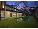 Backyard pool and deck area provides a refreshing outdoor living space with artificial grass and a screened enclosure at 14333 Lake Magdalene Blvd, Tampa, FL 33618