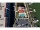 Overhead shot of the community pool, parking area, and boat docks, showcasing the prime waterfront location at 19111 Vista Bay Dr # 401, Indian Shores, FL 33785