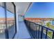 Enjoy outdoor living on this large balcony with black railings and views of the waterfront and complex at 19111 Vista Bay Dr # 401, Indian Shores, FL 33785
