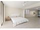 Bright bedroom featuring a closet, neutral walls, and wood-look flooring at 19111 Vista Bay Dr # 401, Indian Shores, FL 33785