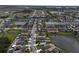 Expansive aerial view of a residential neighborhood with community lakes and lush landscaping at 2007 Hawks View Dr, Ruskin, FL 33570