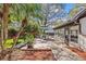 Inviting back deck and patio area, perfect for outdoor entertaining and enjoying the lush backyard scenery at 2207 Boxwood Way, Brandon, FL 33511