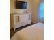 Bedroom featuring a white dresser and a mounted TV at 2235 20Th St S, St Petersburg, FL 33712