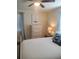 Bright bedroom featuring a cozy white bed, curtains, and bedside tables at 2235 20Th St S, St Petersburg, FL 33712